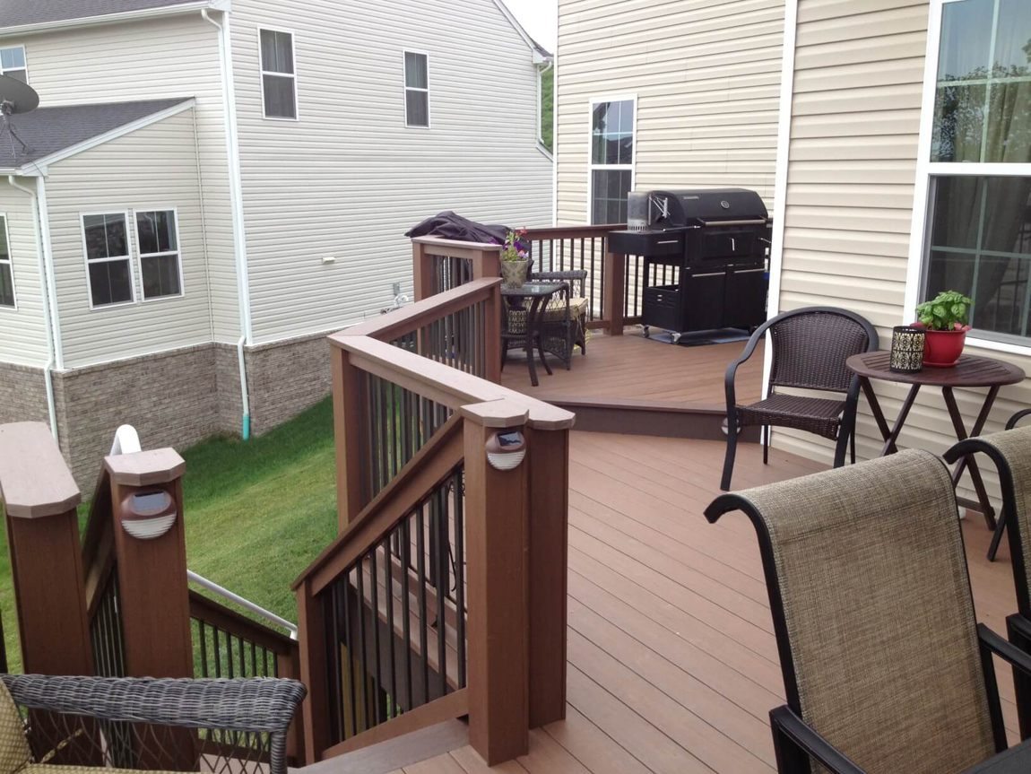 Brown Azek-Decking with railing and stairs